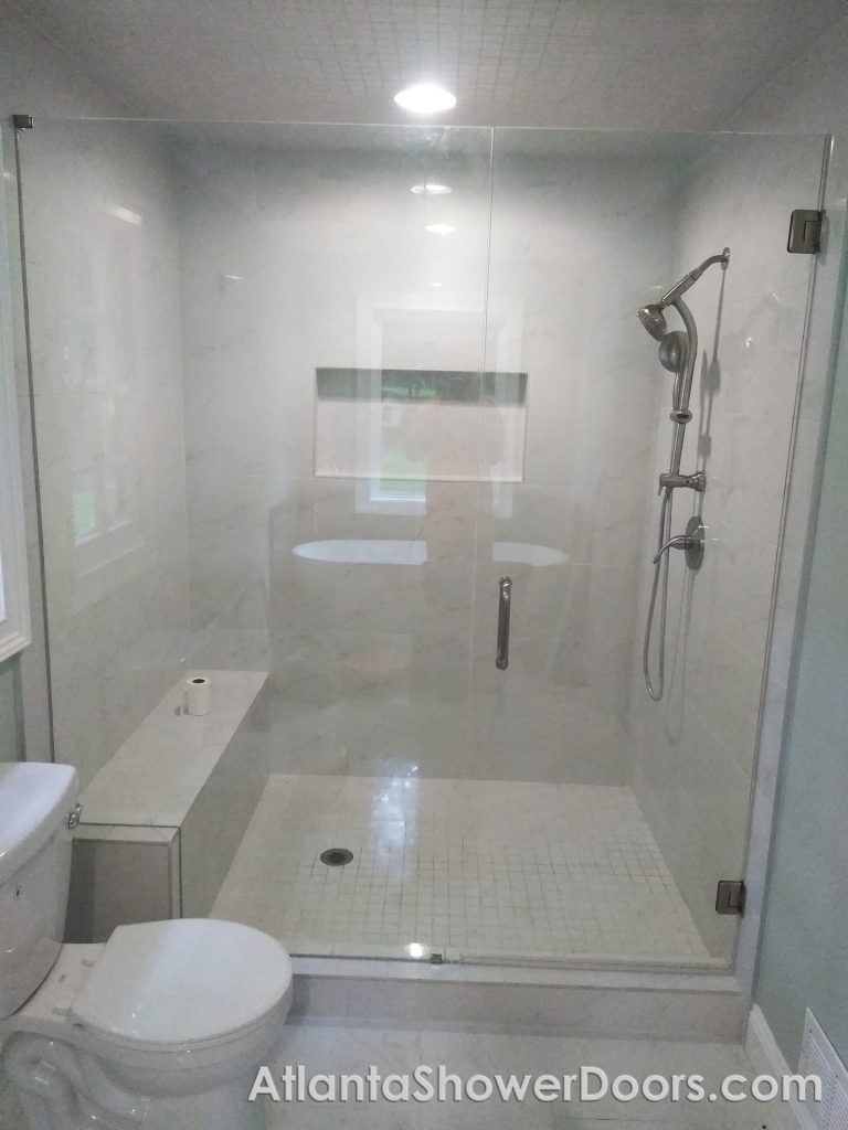 Glass shower with seat